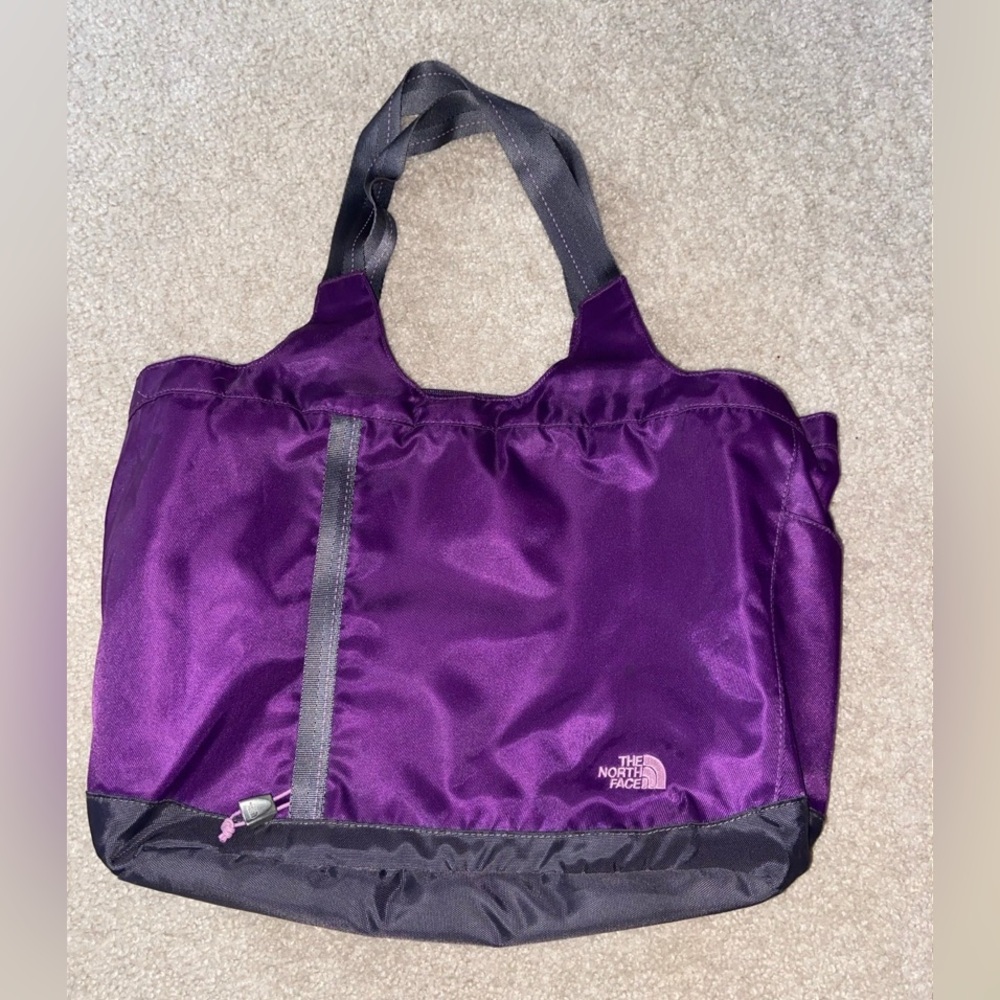 Purple North Face computer bag.